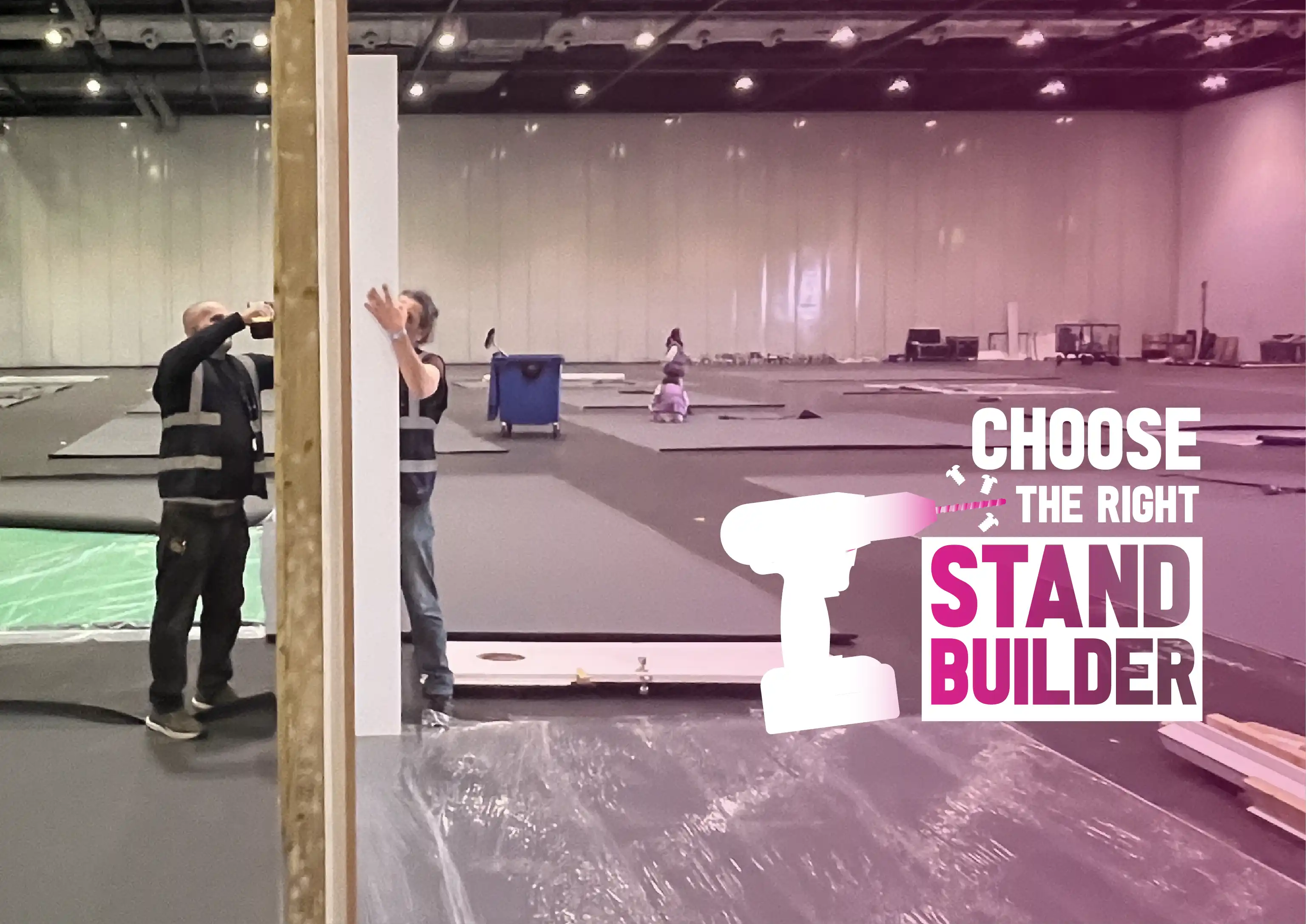 two man setting up an exhibition stand