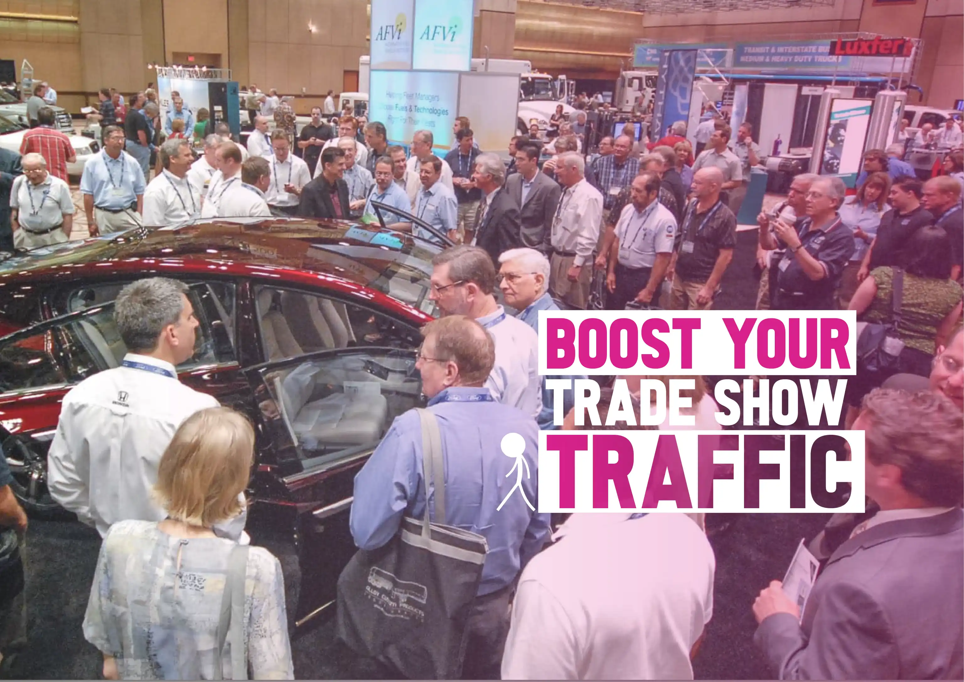 exhibition stand full of people crowded in front of a car
